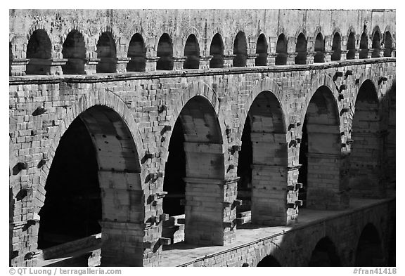 Upper and middle levels of Pont du Gard. France (black and white)