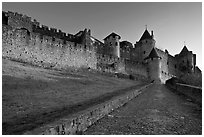 Path leading to old walled city. Carcassonne, France ( black and white)
