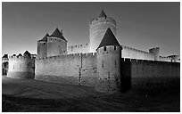 Rampart walls and stone towers. Carcassonne, France ( black and white)