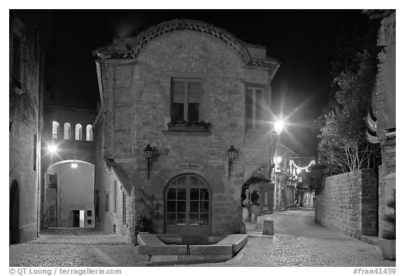 Stone buildings and streets at night. Carcassonne, France (black and white)