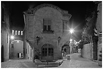 Stone buildings and streets at night. Carcassonne, France (black and white)