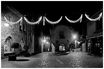 Place a Pierre Pont with Christmas decorations at night. Carcassonne, France (black and white)