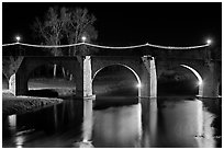 Pont Vieux illuminated by night with Christmas lights. Carcassonne, France ( black and white)
