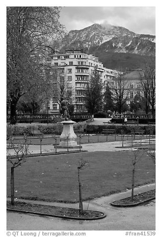 Public garden and snowy mountains. Grenoble, France (black and white)