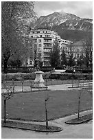 Public garden and snowy mountains. Grenoble, France (black and white)