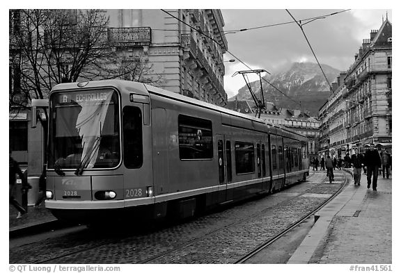 Electric Tramway on downtown street. Grenoble, France (black and white)