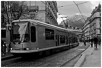 Electric Tramway on downtown street. Grenoble, France (black and white)