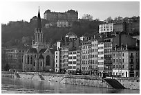 Saint George church and houses on the banks of the Saone River. Lyon, France (black and white)