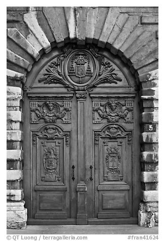 Historic wooden door. Lyon, France (black and white)