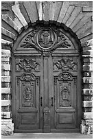 Historic wooden door. Lyon, France (black and white)
