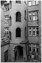 Base of the Tour Rose with traboule passageway. Lyon, France (black and white)