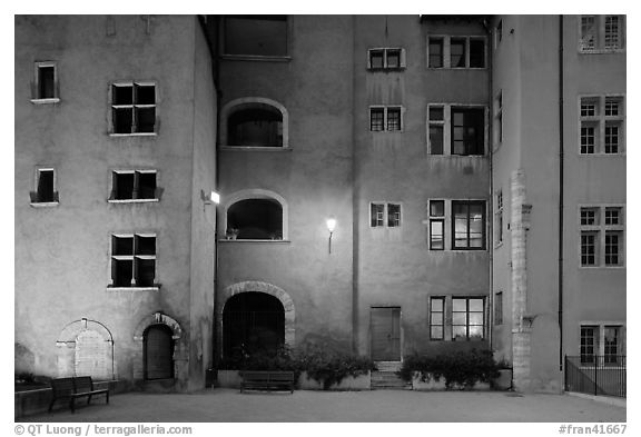 Maison des Avocats facade at night with lights. Lyon, France