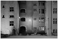 Maison des Avocats facade at night with lights. Lyon, France (black and white)