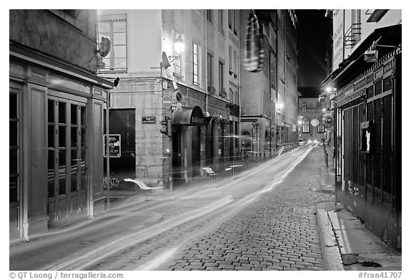 Street with light trails left by cars. Lyon, France