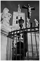 Cross in front of Notre-Dame-des-Doms Cathedral. Avignon, Provence, France ( black and white)