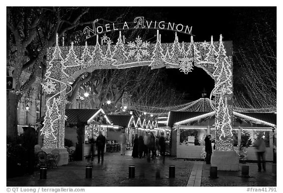 Christmas fair at night. Avignon, Provence, France (black and white)