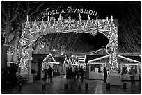 Christmas fair at night. Avignon, Provence, France (black and white)