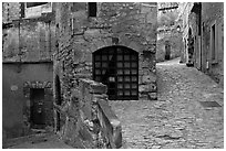 Cobblestone street, Les Baux-de-Provence. Provence, France (black and white)