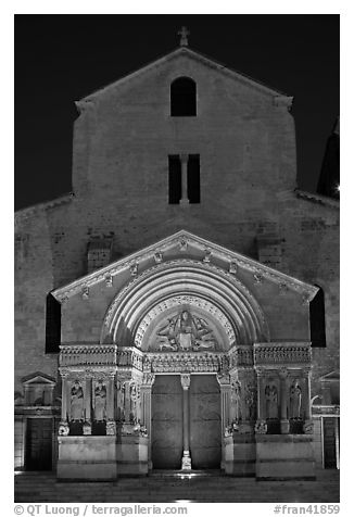Facade of the Saint Trophimus church at night. Arles, Provence, France (black and white)