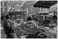 Food shopping in daily vegetable market. Aix-en-Provence, France (black and white)