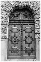 Decorated wooden door. Aix-en-Provence, France (black and white)