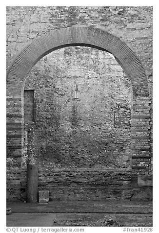 Arch opening in Thermes de Constantin. Arles, Provence, France (black and white)