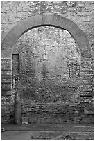 Arch opening in Thermes de Constantin. Arles, Provence, France (black and white)