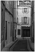 Narrow street in old town. Arles, Provence, France ( black and white)