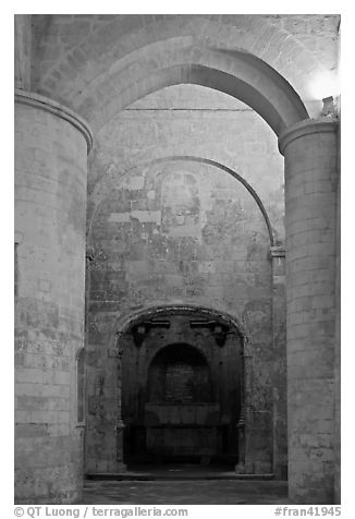 Columns inside romaneque St Honoratus church, Alyscamps. Arles, Provence, France (black and white)
