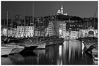Harbor and Notre Dame de la Garde Basilic on hill. Marseille, France (black and white)
