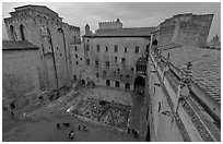 Honnor courtyard and walls from above, Palace of the Popes. Avignon, Provence, France (black and white)