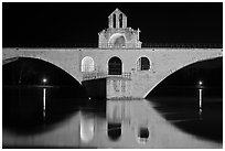 St Benezet Bridge with chapel of St Benezet at night. Avignon, Provence, France (black and white)