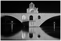 St Benezet Bridge with chapel of St Benezet at night. Avignon, Provence, France (black and white)