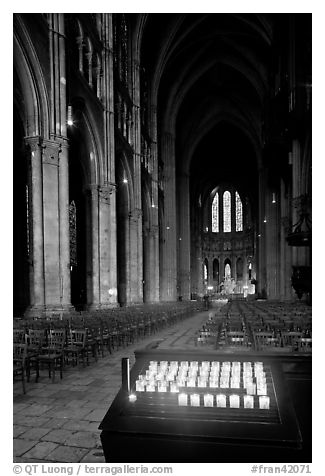 Candles, nave, and apse, Cathedral of Our Lady of Chartres,. France (black and white)