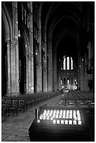 Candles, nave, and apse, Cathedral of Our Lady of Chartres,. France (black and white)