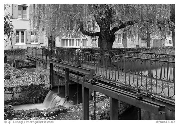 Bridge above canal lock and willow, Chartres. France