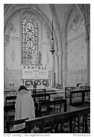 Monks praying in chapel, Saint Quiriace Collegiate Church, Provins. France (black and white)