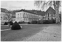 Lawn and forge in winter, Abbaye de Fontenay. Burgundy, France (black and white)