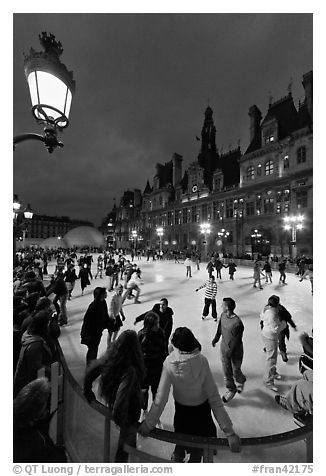 Holiday skating rink at night, City Hall. Paris, France (black and white)