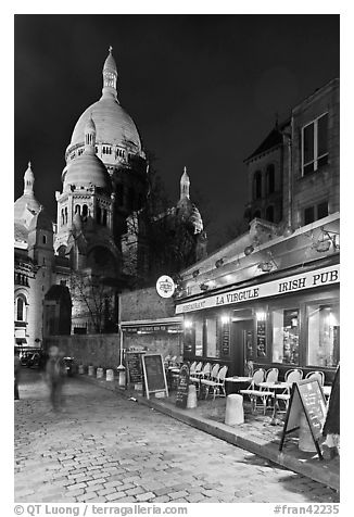 Sacre-Coeur basilica and restaurant by night, Montmartre. Paris, France (black and white)