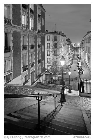 Stairs and street lamps by night, Butte Montmartre. Paris, France (black and white)