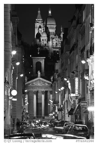 Street, Notre-Dame de Lorette Church, and Sacre-Coeur basilica, Montmartre. Paris, France (black and white)