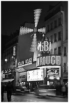 Moulin Rouge (Red Mill) Cabaret by night. Paris, France (black and white)