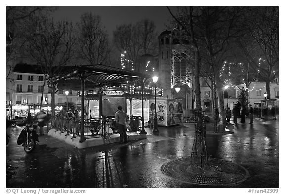 Public square on rainy night. Paris, France (black and white)