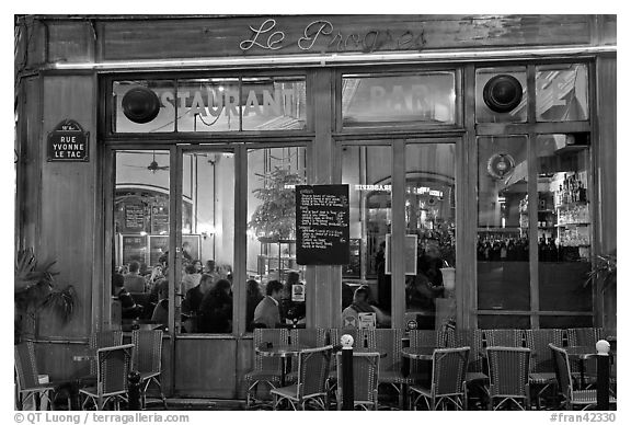 Popular cafe restaurant by night. Paris, France (black and white)
