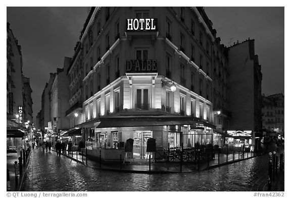 Hotel and pedestrian streets at night. Quartier Latin, Paris, France (black and white)