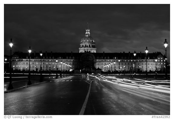 The Invalides: Mansart's dome above Bruant's pedimented central block by night. Paris, France