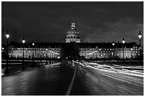 The Invalides: Mansart's dome above Bruant's pedimented central block by night. Paris, France (black and white)