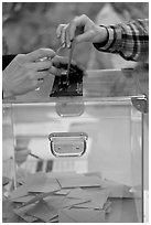 Ballot box with hands. Paris, France (black and white)