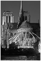 Chevet (head) and buttresses of Notre-Dame by night. Paris, France (black and white)